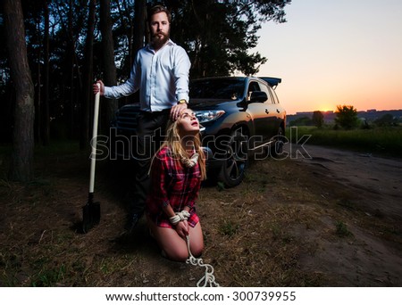 stock-photo-bearded-men-with-kidnapped-girl-300739955.jpg