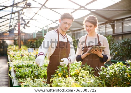 Happy Grandmother Her Granddaughter Working Garden Stock