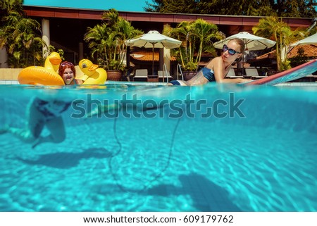 https://thumb9.shutterstock.com/display_pic_with_logo/58832/609179762/stock-photo-beautiful-young-fat-woman-relaxing-in-the-pool-with-yellow-duck-lifebuoy-and-thin-amazing-lady-609179762.jpg