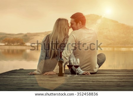 stock photo romantic couple sitting on the pier with red wine 352458836 2 Most Well-known Online Dating Types