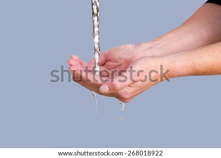 Water Running Into Hands Stock Photo 268018922 - Shutterstock