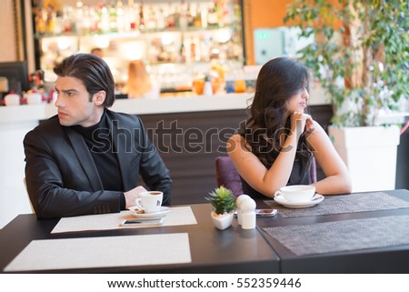 https://thumb9.shutterstock.com/display_pic_with_logo/61339/552359446/stock-photo-beautiful-young-couple-in-restaurant-arguing-552359446.jpg