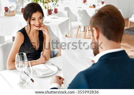 https://thumb9.shutterstock.com/display_pic_with_logo/614404/355992836/stock-photo-romantic-couple-in-love-having-dinner-in-luxury-gourmet-restaurant-happy-beautiful-lovely-people-355992836.jpg