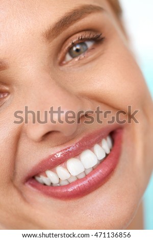 https://thumb9.shutterstock.com/display_pic_with_logo/614404/471136856/stock-photo-beautiful-smile-closeup-of-beautiful-happy-smiling-woman-with-white-teeth-and-fresh-face-beauty-471136856.jpg