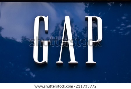 PARIS, FRANCE - AUGUST 4TH 2014: The sign for the 'GAP' store on Avenue des Champs-Elysees in Paris on 4th August 2014. Founded in 1967, GAP is a multinational clothing and accessories retailer.