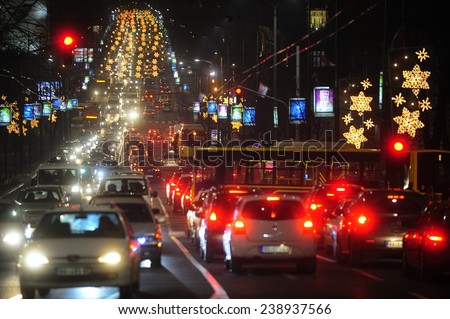 BELGRADE, SERBIA - DECEMBER 12, 2014: Rush hour on Belgrade streets under New Year's lighting