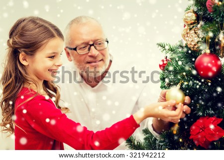 People Decorating A Christmas Tree family decorating tree stock images, royalty-free images & vectors People Decorating A Christmas Tree family decorating tree stock images, royalty-free images & vectors