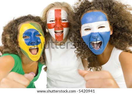 Small group of screaming, international sports fans with painted flags on faces and with clenched fists. Looking at camera. Front view, white background