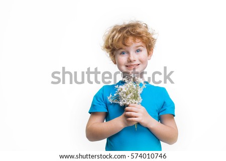 boy with red hair and freckles, ?hild with a bouquet of white flowers in a blue shirt isolated on white background, son gives mom flowers on Women's Day, Mother's Day, birthday