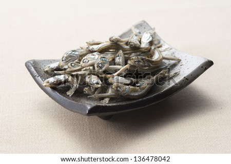 Dried sardine on a small dish