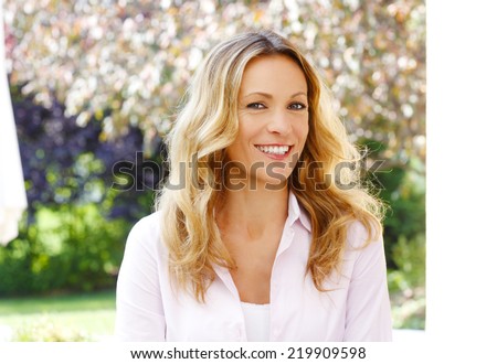 https://thumb9.shutterstock.com/display_pic_with_logo/665353/219909598/stock-photo-close-up-portrait-of-beautiful-mature-woman-sitting-at-garden-219909598.jpg
