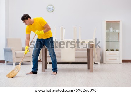 Cleaning The House man husband cleaning house helping his stock photo 598268132 Cleaning The House man husband cleaning house helping his stock photo 598268132