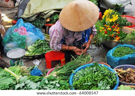 Vietnamese saleswoman at the market