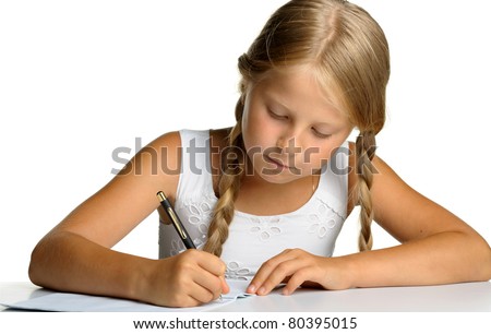 The girl writes to writing-books. The decision of lessons. It is isolated on a white background