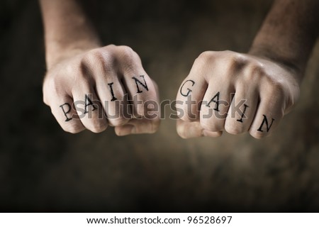 Man With Fake Tattoos Pain And Gain On His Hands Referring Man With Fake Tattoos Pain And Gain On His Hands Referring