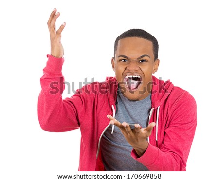Closeup portrait of handsome young man, shocked, surprised, wide open mouth, mad by what he sees on his cell phone, isolated on white background. Negative human emotions, facial expressions, feelings