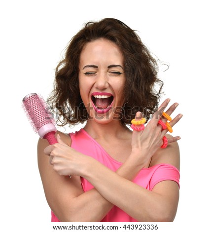 https://thumb9.shutterstock.com/display_pic_with_logo/697744/443923336/stock-photo-closeup-portrait-of-happy-fashion-brunette-woman-with-big-hair-brush-and-scrunchy-screaming-yelling-443923336.jpg