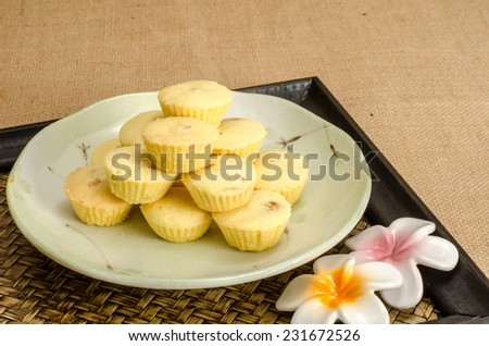 Image of cup cookie stuffed with pineapple in ceramic dish