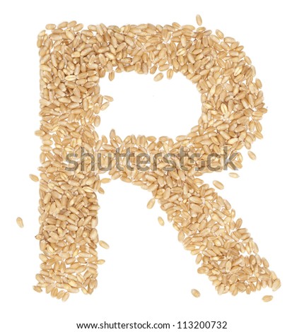 R, Alphabet from dry wheat berries. - stock photo