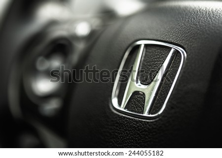 BORGUND, NORWAY - AUGUST 1, 2014: Honda Black Steering Wheel And Silver Star Logo