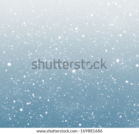 falling snow on the blue background