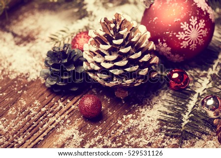 Christmas concept. Decorative tree next to decorations and craft supply. Selective focus