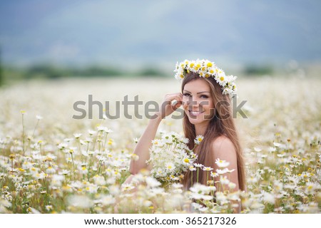 https://thumb9.shutterstock.com/display_pic_with_logo/745759/365217326/stock-photo-beautiful-woman-enjoying-daisy-field-nice-female-lying-down-in-meadow-of-flowers-pretty-girl-365217326.jpg