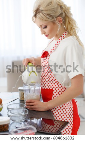 Woman Decorating Cupcakes beautiful cook showing stock images, royalty-free images & vectors Woman Decorating Cupcakes beautiful cook showing stock images, royalty-free images & vectors