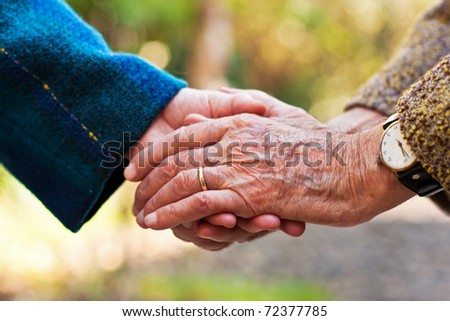 Elderly Couple Holding Hands Outdoors Stock Photo (Royalty Free - 450x320 - jpeg Elderly Couple Holding Hands