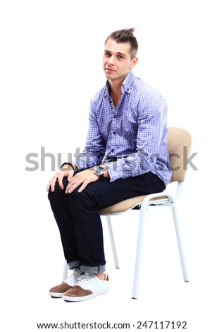 stock-photo-young-caucasian-handsome-man-sitting-on-the-chair-isolated-over-white-background-247117192.jpg
