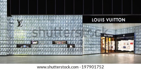 SHANGHAI-JUNE 4, 2014. Louis Vuitton outlet at Lujiazui. Despite Chinaâ��s luxury slowdown LVMH Mo�«t Hennessy Louis Vuitton, the worldâ��s largest luxury conglomerate, saw 8 percent China growth in 2013.