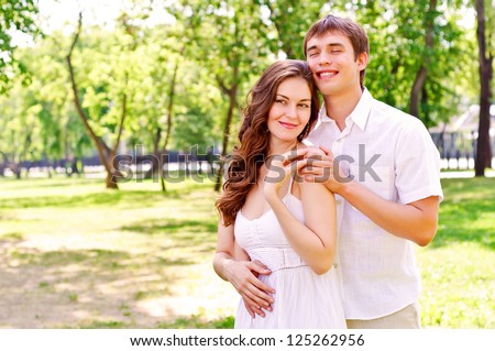 https://thumb9.shutterstock.com/display_pic_with_logo/787933/125262956/stock-photo-couple-hugging-in-the-park-have-a-good-time-together-125262956.jpg