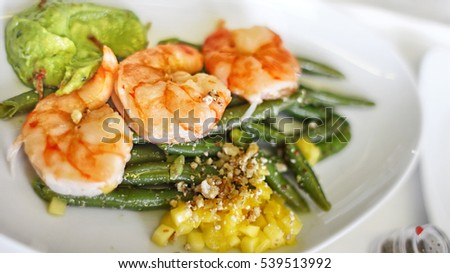 Grilled Shrimp entree with Roasted String Green Beans and Avocado Corn salsa
