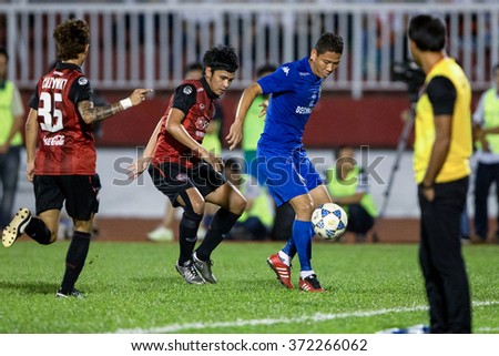 HO CHI MINH-VIETNAM JANUARY23:Nguyen Anh Duc (blue) of Binh Duong in action during The SCG Muangthong Utd Asean Tour 2016 Binh Duong and Muangthong Utd at Thong Nhat Stadium on Jan23,2016 in Vietnam