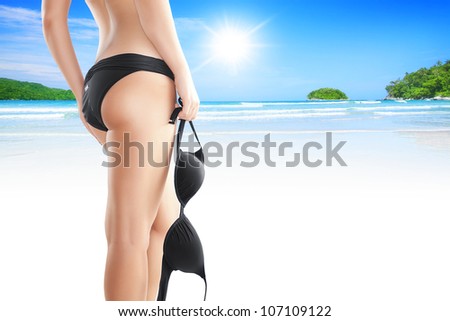 Close up view of nice smooth woman�s legs on color back