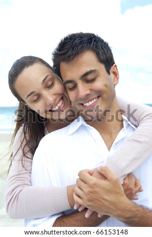 https://thumb9.shutterstock.com/display_pic_with_logo/80635/80635,1290982518,202/stock-photo-happy-couple-in-love-daydreaming-together-on-the-beach-66153148.jpg