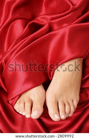 womans foot red silk sheet stock photo royalty free 2809992 red silk sheet
