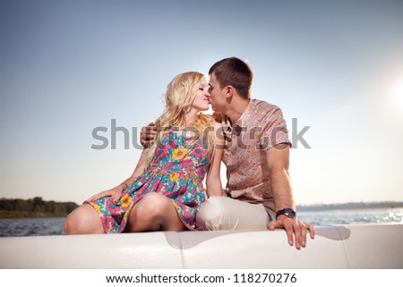 why american men cant find wives  How Much is a Mailorder Bride? stock photo kissing happy couple on the boat 118270276
