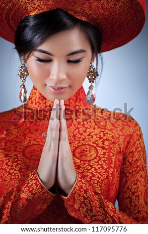https://thumb9.shutterstock.com/display_pic_with_logo/81383/117095776/stock-photo-young-vietnamese-woman-in-traditional-clothing-portrait-117095776.jpg