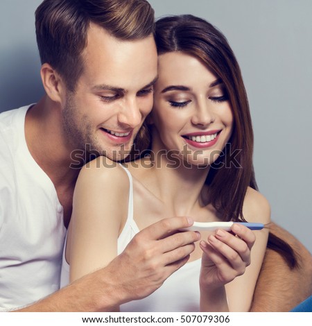 stock photo beautiful young amorous couple finding out results of a pregnancy test caucasian white models 507079306