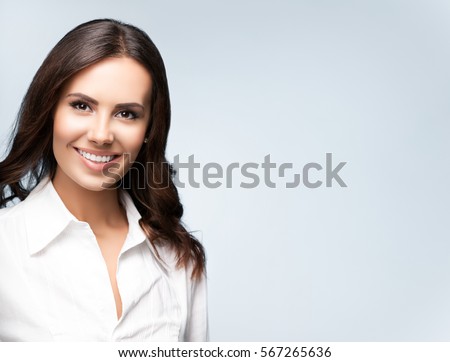 https://thumb9.shutterstock.com/display_pic_with_logo/82755/567265636/stock-photo-portrait-of-happy-smiling-young-cheerful-brunette-businesswoman-with-blank-copyspace-area-for-567265636.jpg