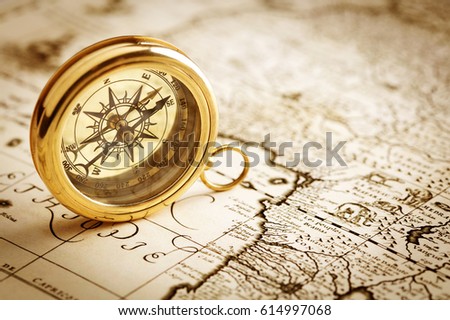 Compass on old map