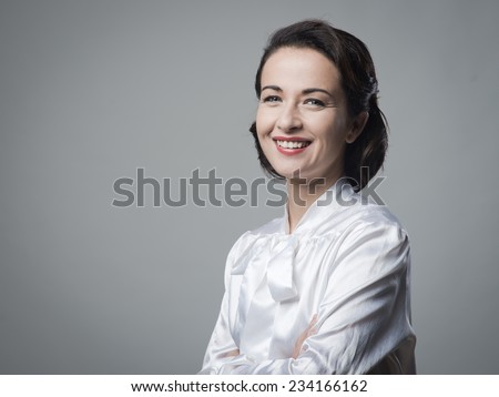 https://thumb9.shutterstock.com/display_pic_with_logo/875983/234166162/stock-photo-cheerful-elegant-vintage-woman-portrait-smiling-at-camera-234166162.jpg