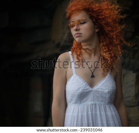 https://thumb9.shutterstock.com/display_pic_with_logo/886765/239031046/stock-photo-beautiful-redhead-woman-in-a-white-dress-outdoor-239031046.jpg
