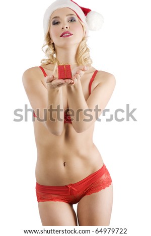 very cute and sexy santa calus in red lingerie showing a little gift box