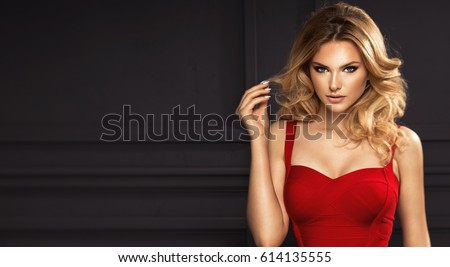 https://thumb9.shutterstock.com/display_pic_with_logo/897853/614135555/stock-photo-sensual-beautiful-blonde-woman-posing-in-red-dress-girl-with-long-curly-hair-614135555.jpg