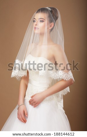 https://thumb9.shutterstock.com/display_pic_with_logo/900991/188144612/stock-photo-sensuality-woman-with-transparent-wedding-veil-188144612.jpg