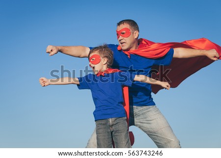 stock-photo-father-and-son-playing-superhero-at-the-day-time-people-having-fun-outdoors-concept-of-friendly-563743246.jpg