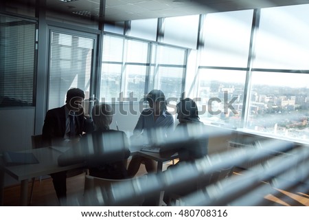 stock-photo-buiseness-meeting-in-dark-room-480708316.jpg