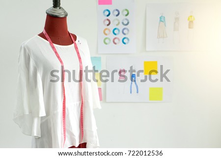 Fashion Designer Work In The Studio With Graphic And Tailor Tool White Tone Fashion Designer Work In The Studio With Graphic And Tailor Tool White Tone